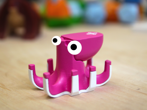 physical game piece with cartoon eyes